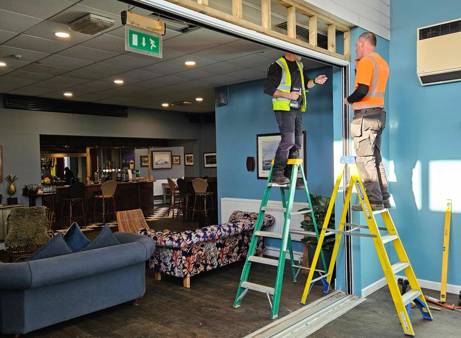 Burgun Contractors installing large bifold doors